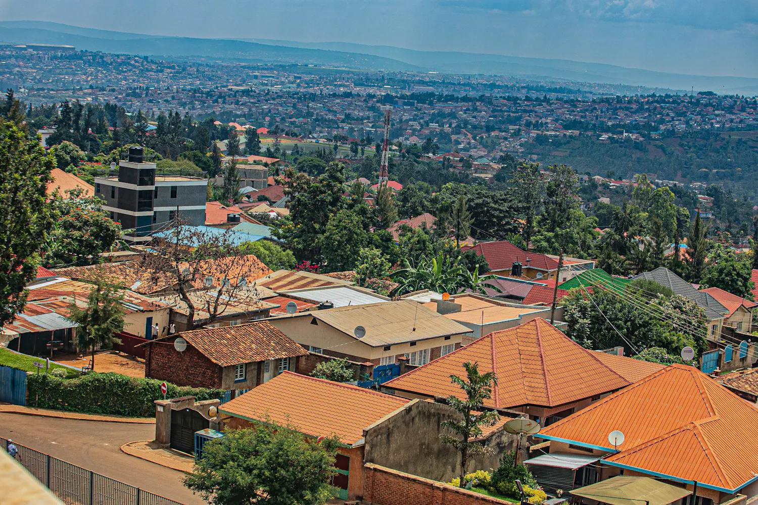 Terracotta rooftops across a Kigali hillside
